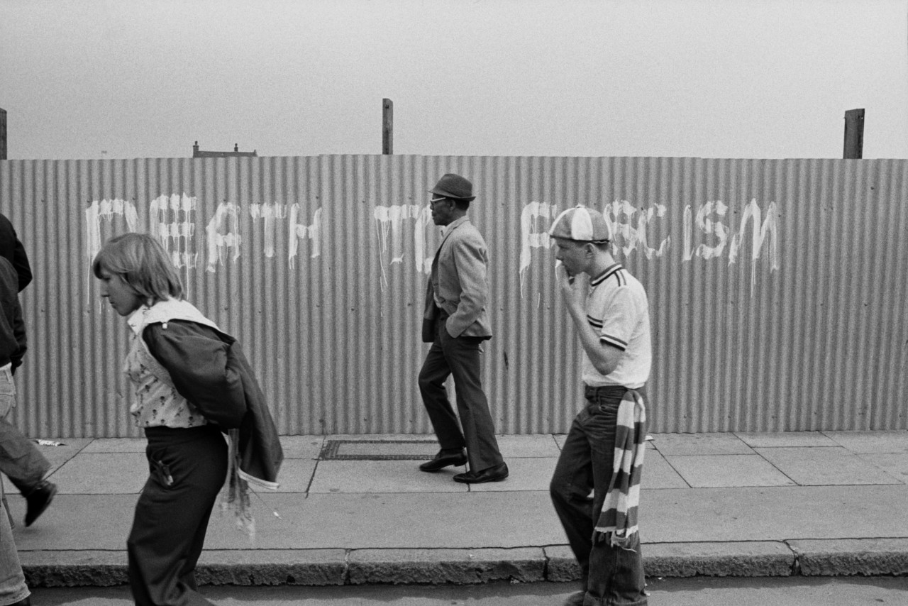 GB. England. London. National Front Demo, anti fascism graffitti. 1977.